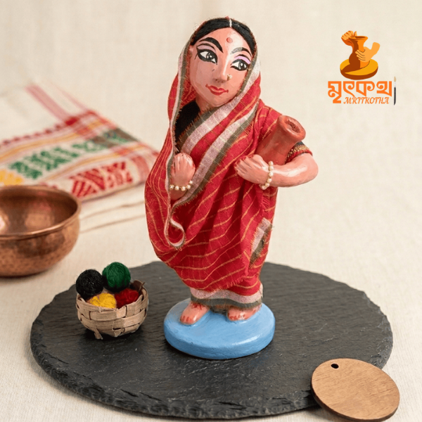 কলসি হাতে গাঁয়ের বধূ